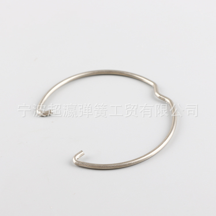 Impact inner spring ring retaining spring