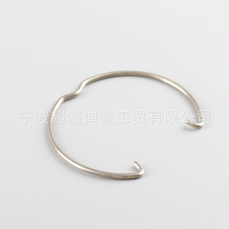 Impact inner spring ring retaining spring