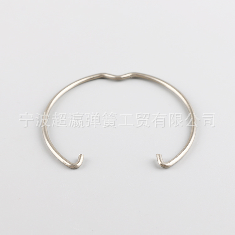 Impact inner spring ring retaining spring