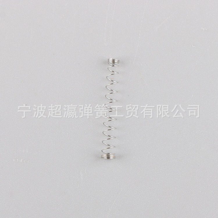 Needle seat spring